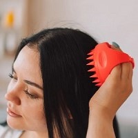 Do scalp massagers really help promote hair growth? We asked the experts