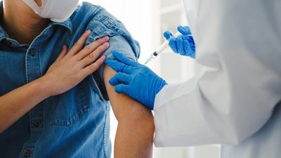 man getting an allergy shot